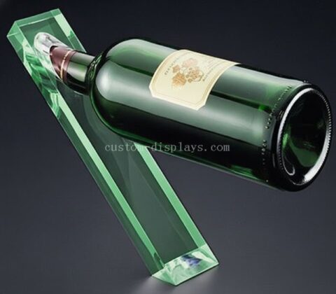 Soporte acrílico equilibrado para una botella de vino