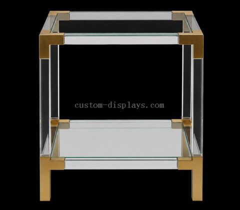 Mesa auxiliar de acrílico transparente con detalles de metal dorado
